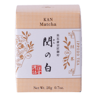 New unopened peach box of Ippodo Tea Co. Kan matcha powder with Japanese characters and gold leaf flowers embossed