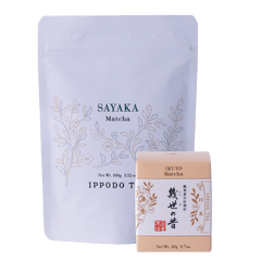 Two packages of matcha tea, one larger and one smaller, with 'SAYAKA Matcha' branding.