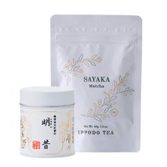 White Sayaka Matcha 40g can packaging beside 40g bag packaging with gold leaf designs by IPPODO TEA
