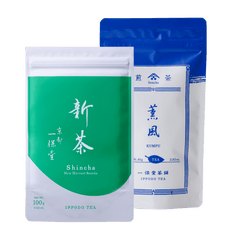 Bright green and white pouch of Uji Shincha tea with white Japanese writing beside blue package of Kumpu premium sencha tea