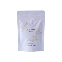 White resealable 40 gram bag of Ippodo Ummon matcha with gold and green floral design and text
