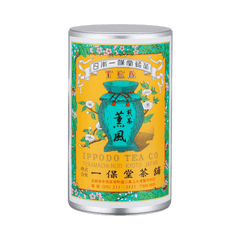 Iconic colorful Ippodo Tea metal can with yellow turquoise and pink label of teapot and flowers for Kumpu sencha green tea