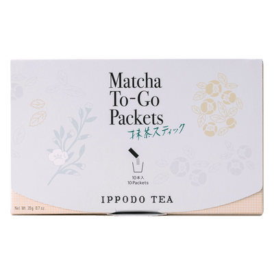 Slim peach color box of Matcha-To-Go Packets with light grey flap to open on front with faint multicolored flowers petals