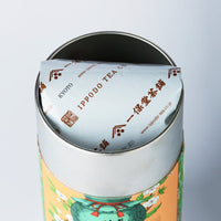 Iconic colorful Ippodo Tea metal can of Kaboku Japanese sencha green tea with top open revealing branded foil bag inside