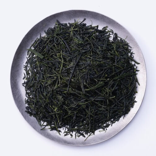 Indigo-green, needle-like leaves