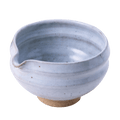 Artisan-made ceramic speckled white matcha tea bowl with hand groove and serving spout made from Mino-yaki Japanese clay