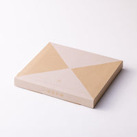 Closed decorative paper box for Winter Gift: Aficiondo Set with large triangle pattern on front