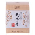 Unopened box of Ippodo Tea Co. Ikuyo matcha powder with peach color hashmarks, Japanese characters and gold flowers leaves