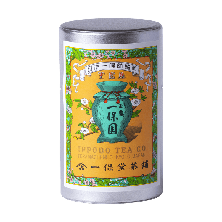 Tea canister with iconic colorful label featuring a green teapot and floral design with Japanese characters