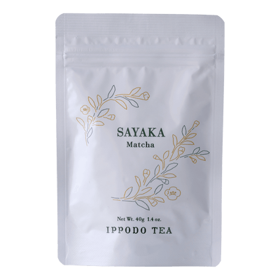 White resealable 40 gram bag of Ippodo Sayaka matcha with gold and green floral design and text