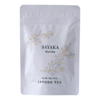 White resealable 40 gram bag of Ippodo Sayaka matcha with gold and green floral design and text