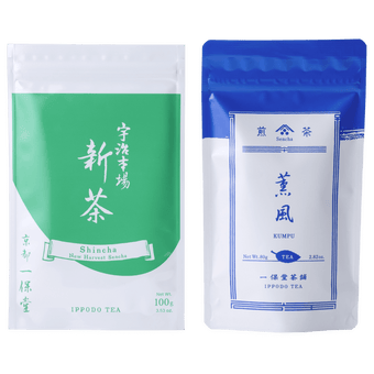 Bright green and white pouch of Uji Shincha tea with white Japanese writing beside blue package of Kumpu premium sencha tea