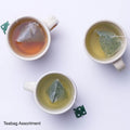 Three cups of tea with Ippodo teabags on a white background, labeled 'Teabag Assortment'.