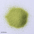 Ippodo Tea Uji-Shimizu sweetened matcha powder stone-ground green tea sprinkled on white plate
