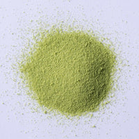 Ippodo Tea Uji-Shimizu sweetened matcha powder stone-ground green tea sprinkled on white plate