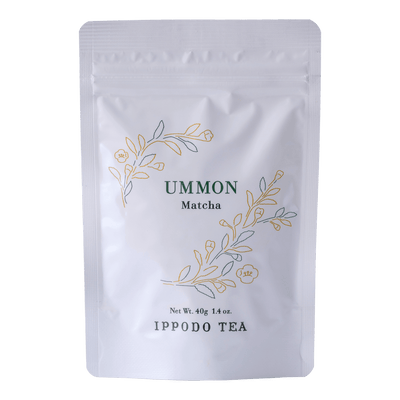 White resealable 40 gram bag of Ippodo Ummon matcha with gold and green floral design and text