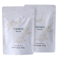 Two white 40g bag tea packages labeled 'Ummon' and 'Sayaka' from Ippodo Tea with gold leaf designs