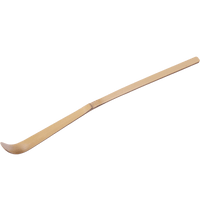 Long handle Ippodo bamboo tea ladle (Chashaku) with rounded tip for scooping matcha powder against white background