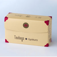 Sealed long beige box of 25 Gyokuro Teabags with pink corners, easy open tab and Ippodo Tea logo on bronze circle
