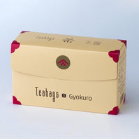 Sealed long beige box of 25 Gyokuro Teabags with pink corners, easy open tab and Ippodo Tea logo on bronze circle