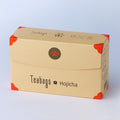 Sealed long beige box of 25 Hojicha Teabags with orange corners, easy open tab and Ippodo Tea logo on bronze circle