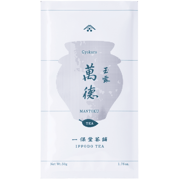 White packaging bag for Mantoku Gyokuro by Ippodo Tea with grey pointillism teapot and teal writing and designs