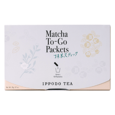 Slim peach color box of Matcha-To-Go Packets with light grey flap to open on front with faint multicolored flowers petals