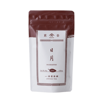 White packaging with brown faux-painted details for Nichigetsu refreshing Japanese Sencha green tea 80g bag by Ippodo Tea Co.
