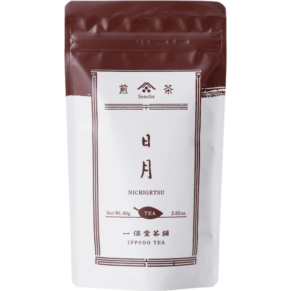 White packaging with brown faux-painted details for Nichigetsu refreshing Japanese Sencha green tea 80g bag by Ippodo Tea Co.