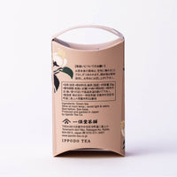 Back of unopened pale pink decorative box of Ippodo Tea Nodoka matcha with flower drawing and brewing instructions