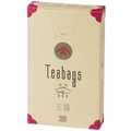 Sealed tall, cream box of 12 Ippodo Gyokuro One-Cup Teabags with pink corners and logo on bronze circle and easy open tab