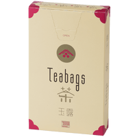 Sealed tall, cream box of 12 Ippodo Gyokuro One-Cup Teabags with pink corners and logo on bronze circle and easy open tab