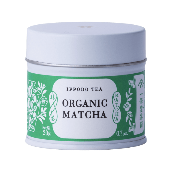Brand new bright green and white unopened tin of Organic Matcha green tea powder with iconic Ippodo tea pot and floral design