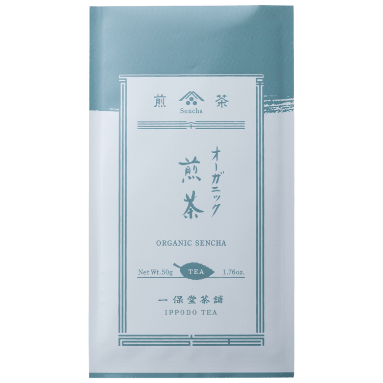White and pale blue grey traditional packaging bag with Japanese characters for Ippodo Tea Co. Rimpo Organic Sencha green tea