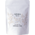 White resealable 100 gram bag of Ippodo Sayaka matcha with gold minimalist floral design
