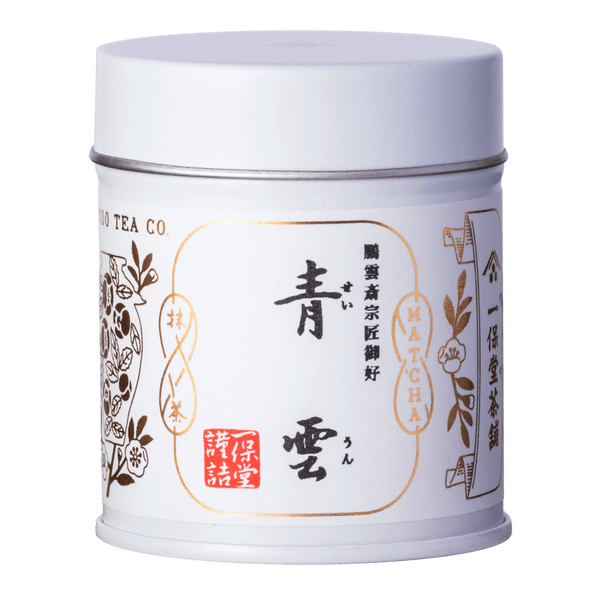 Brand new unopened tin can of Ippodo Tea Seiun matcha with Japanese characters and gold leaf embossed on white