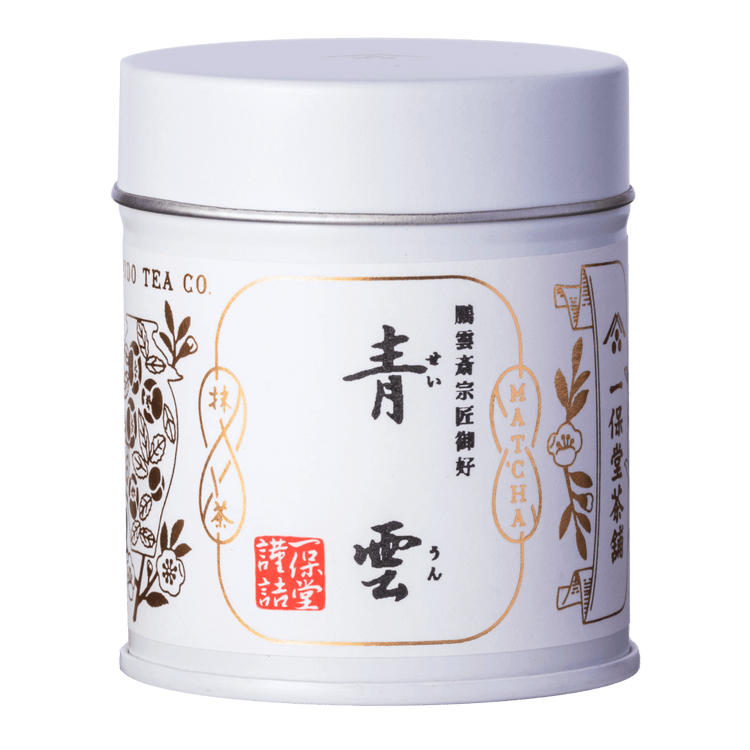 Brand new unopened tin can of Ippodo Tea Seiun matcha with Japanese characters and gold leaf embossed on white