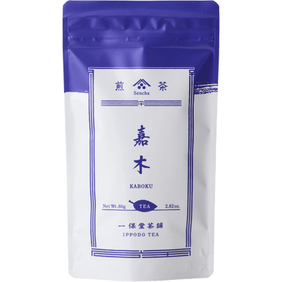 White packaging with indigo violet faux-painted details of Kaboku Sencha prized Japanese green tea 80g bag by Ippodo Tea Co.