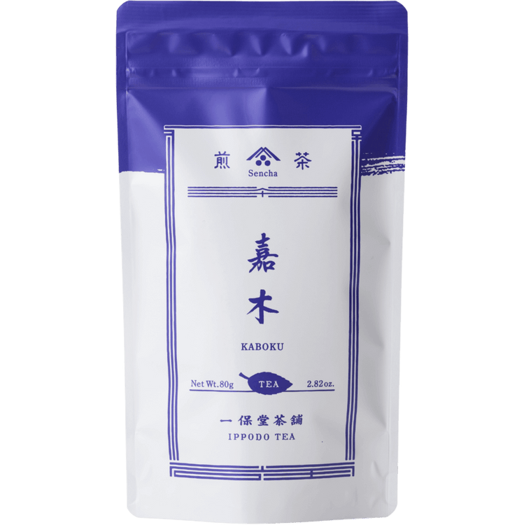 White packaging with indigo violet faux-painted details of Kaboku Sencha prized Japanese green tea 80g bag by Ippodo Tea Co.