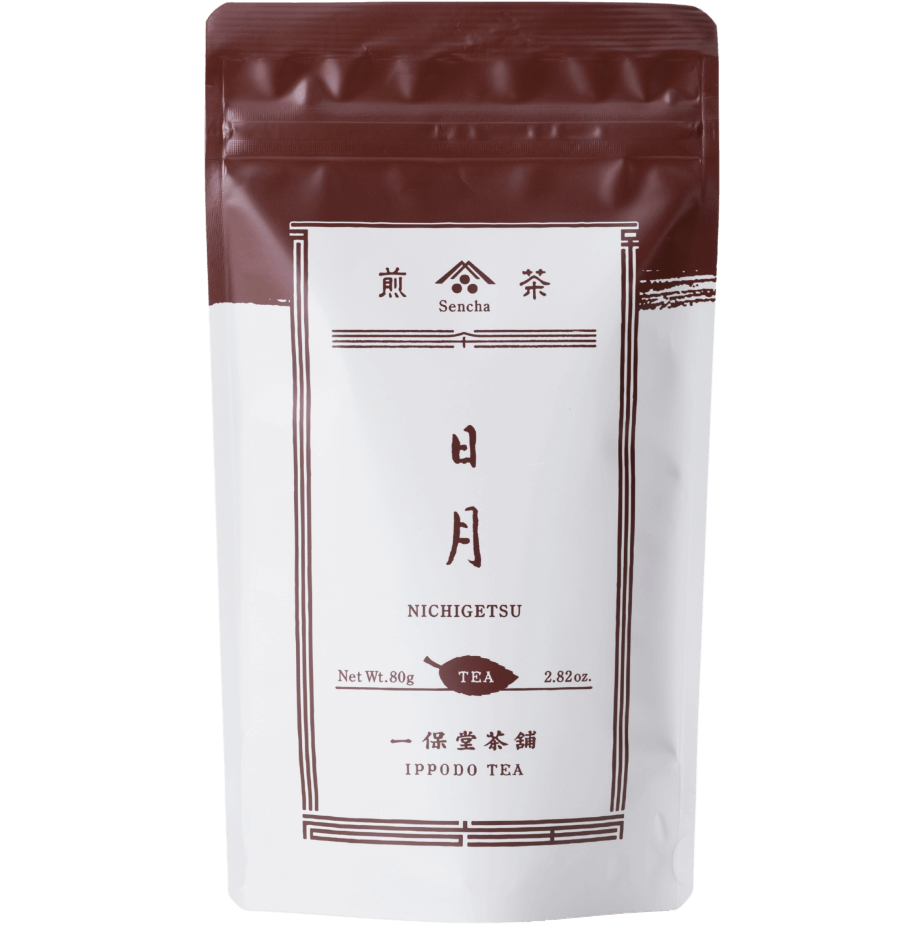 White packaging with brown faux-painted details for Nichigetsu refreshing Japanese Sencha green tea 80g bag by Ippodo Tea Co.