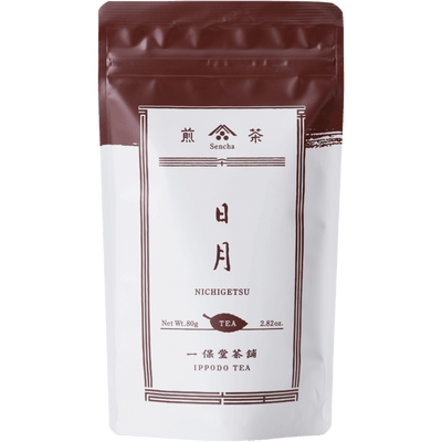 White packaging with brown faux-painted details for Nichigetsu refreshing Japanese Sencha green tea 80g bag by Ippodo Tea Co.