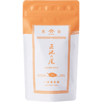 White packaging with orange faux-painted details for Shoike classic Japanese Sencha green tea 80g bag by Ippodo Tea Co.
