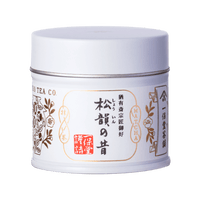 Brand new unopened tin can of Ippodo Tea Shoin matcha with Japanese characters and gold leaf embossed on white