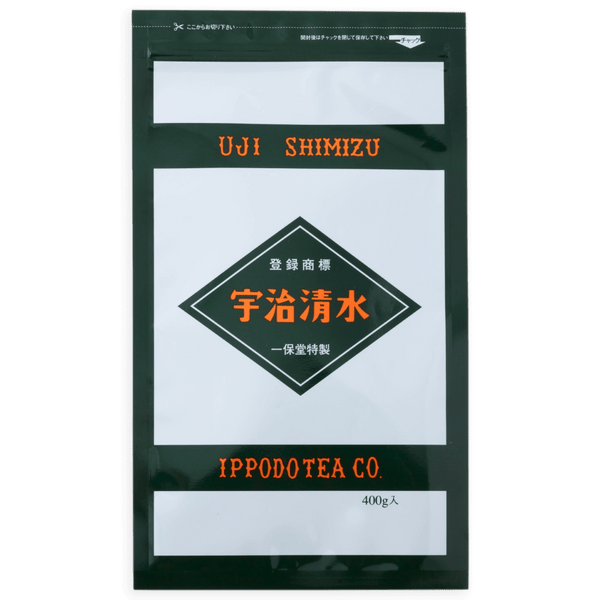 Grey and black large bag of Ippodo's Uji-Shimizu sweetened matcha tea powder with red font Japanese characters