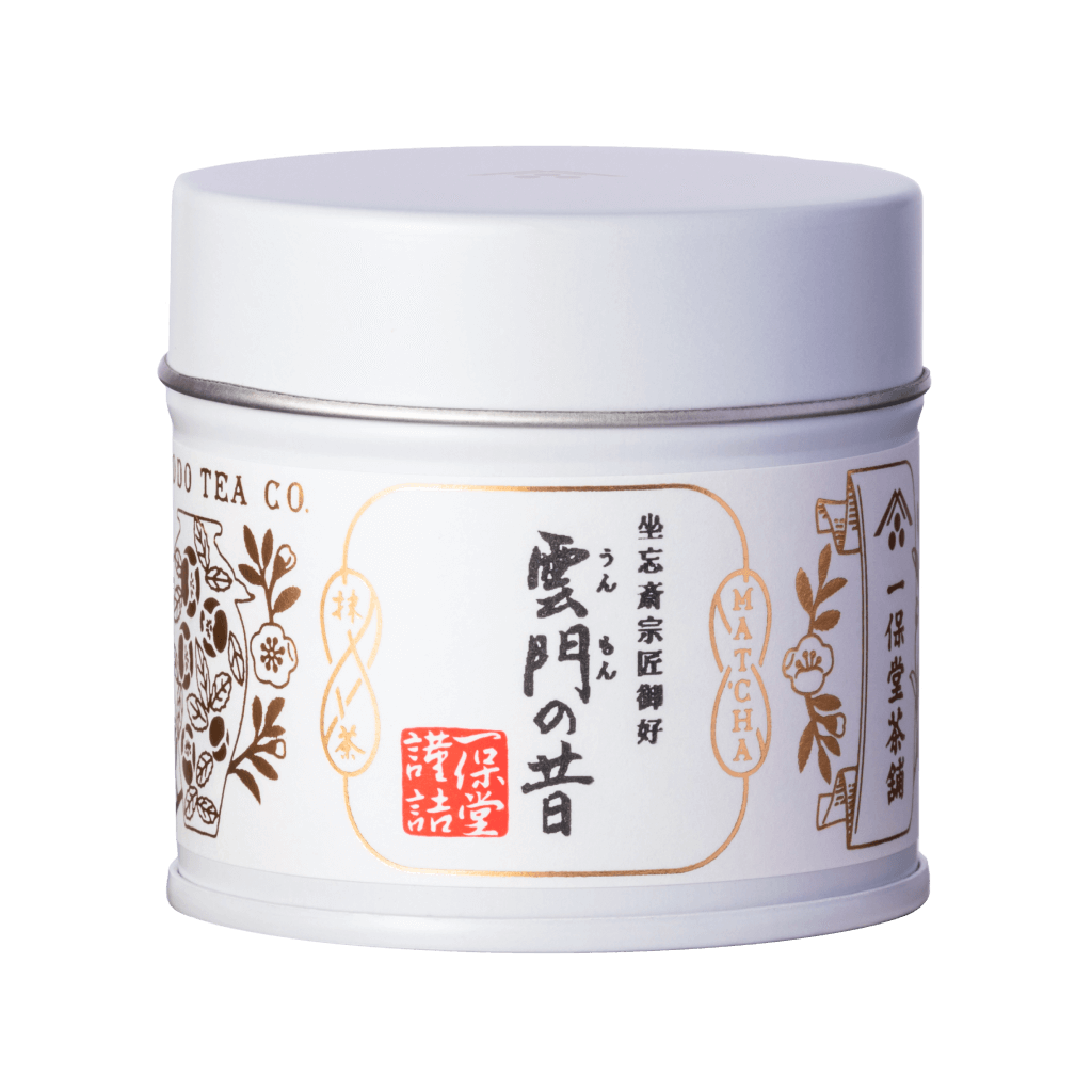 Brand new unopened tin can of Ummon Ummon-no-mukashi matcha with Japanese characters and gold leaf embossed on white