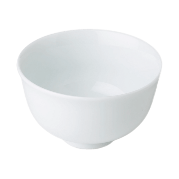 White porcelain Japanese teacup with slight curve outwards at lip against plain background