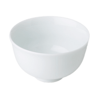 White porcelain Japanese teacup against white background