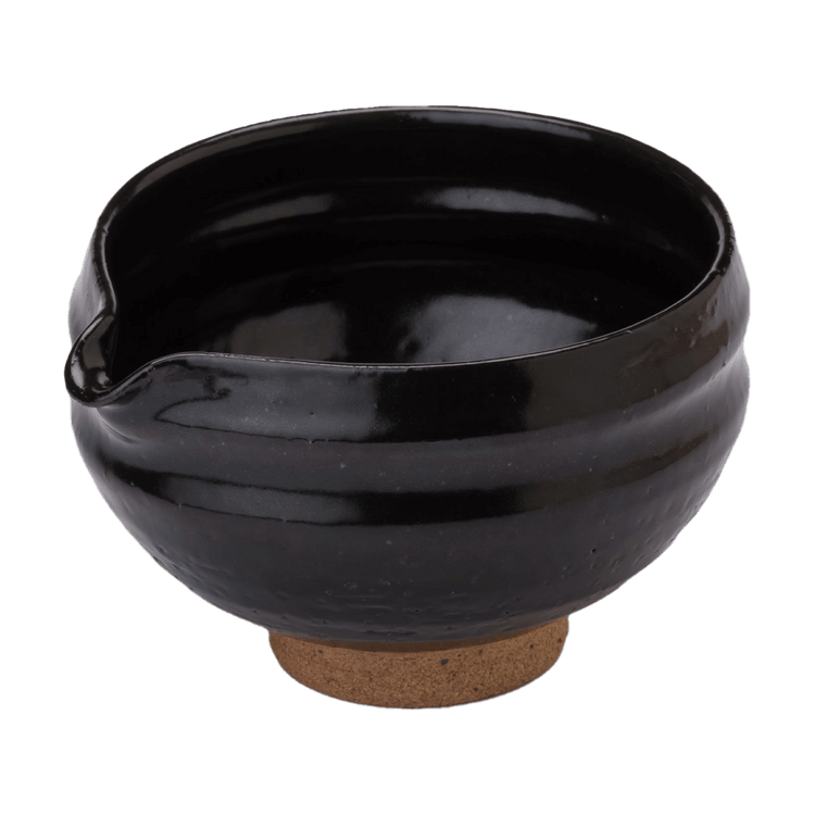 Artisan-made ceramic speckled black matcha tea bowl with hand groove and serving spout made from Mino-yaki Japanese clay