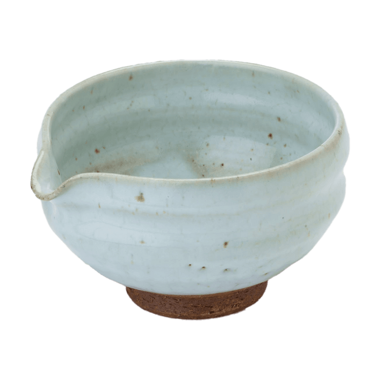 Artisan-made ceramic speckled white matcha tea bowl with hand groove and serving spout made from Mino-yaki Japanese clay