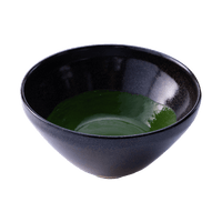 Sleek shiny cone shaped speckled black glazed ceramic matcha tea bowl with dark green coating of thick koicha matcha inside